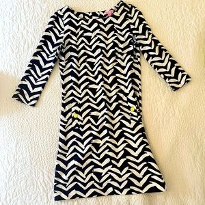 Women’s navy blue and white Lilly Pulitzer dress.